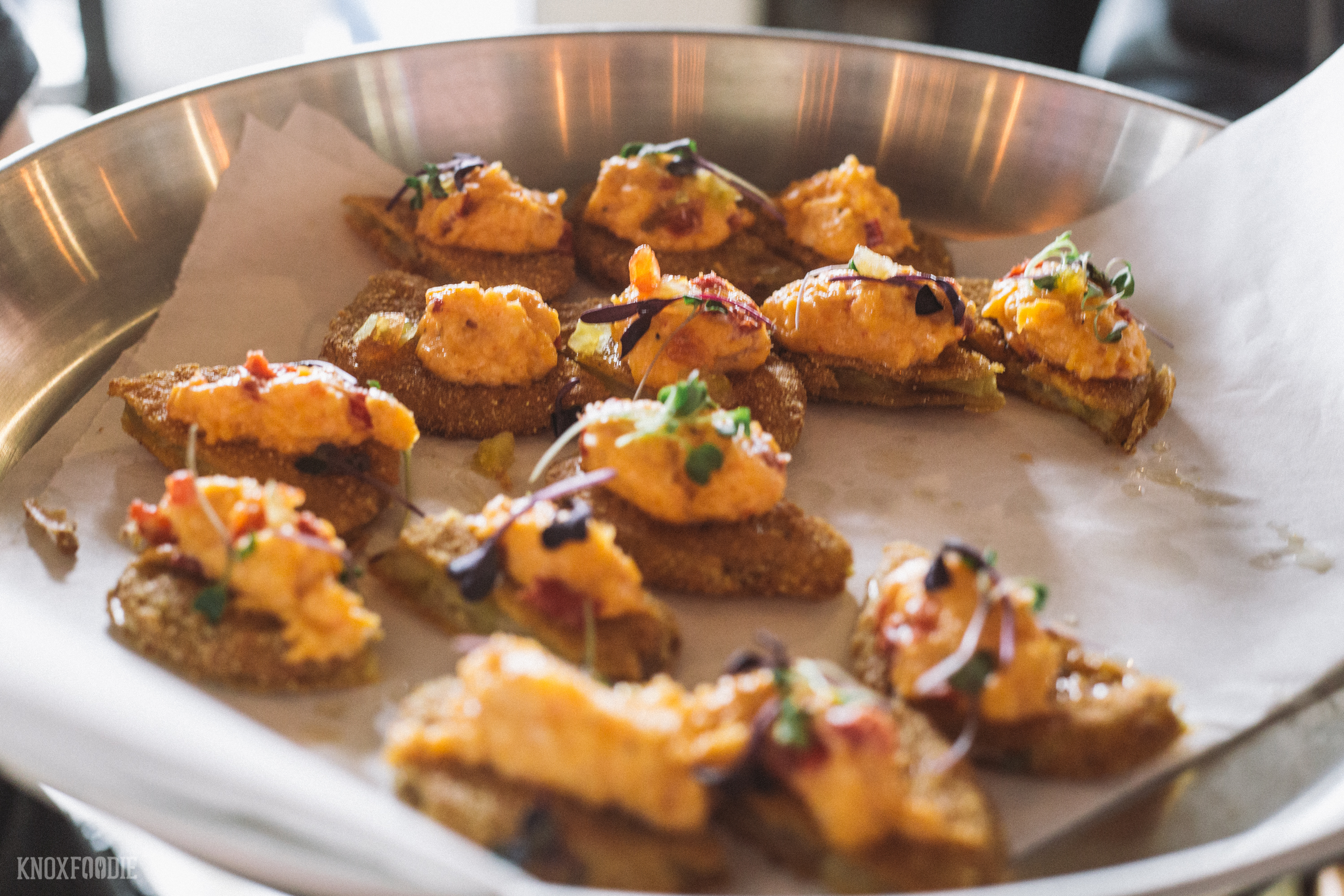 Fried green tomatoes topped with pimento cheese.