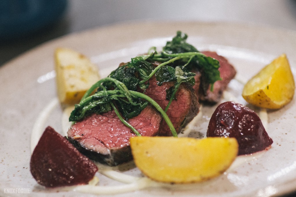 Denver Steak, roasted potatoes and beets, wilted watercress at J.C. Holdway